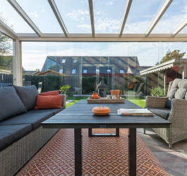 Luxury veranda with a glass roof